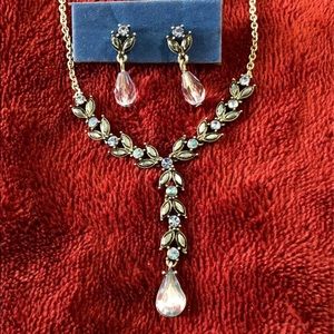 Blue bead-stone necklace with matching earrings.